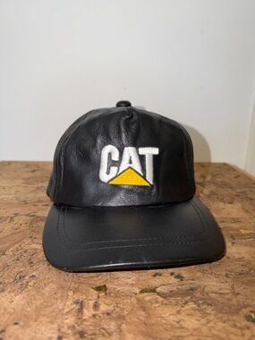 Caterpillar Black Leather Cap with Yellow Logo